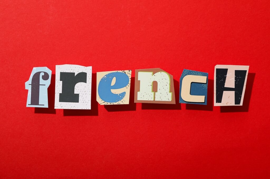 The word French on a red background, top view.